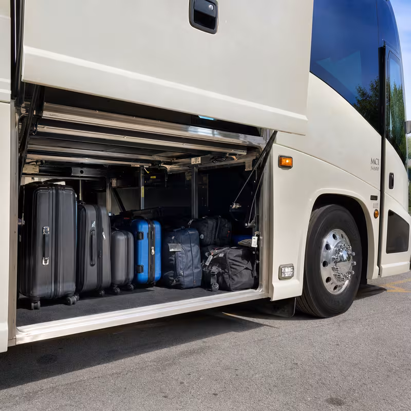 Party bus interior with wraparound leather seating and LED lighting in New Orleans