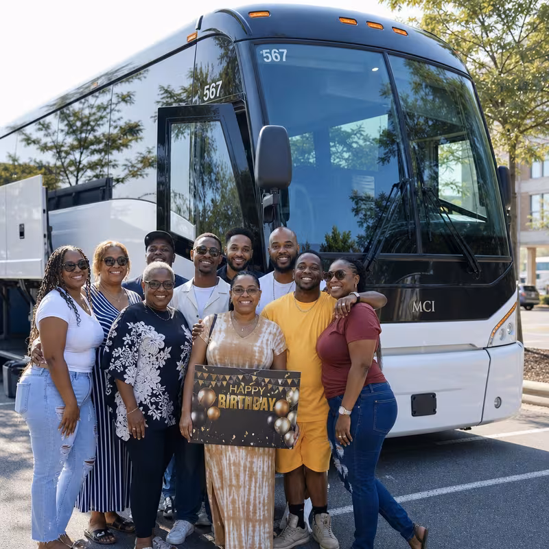 Passengers loading luggage while boarding an New Orleans group shuttle