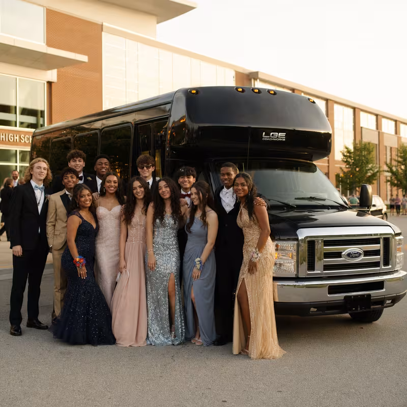 Group boarding a white charter bus for Prom & Homecoming Transportation transportation in New Orleans