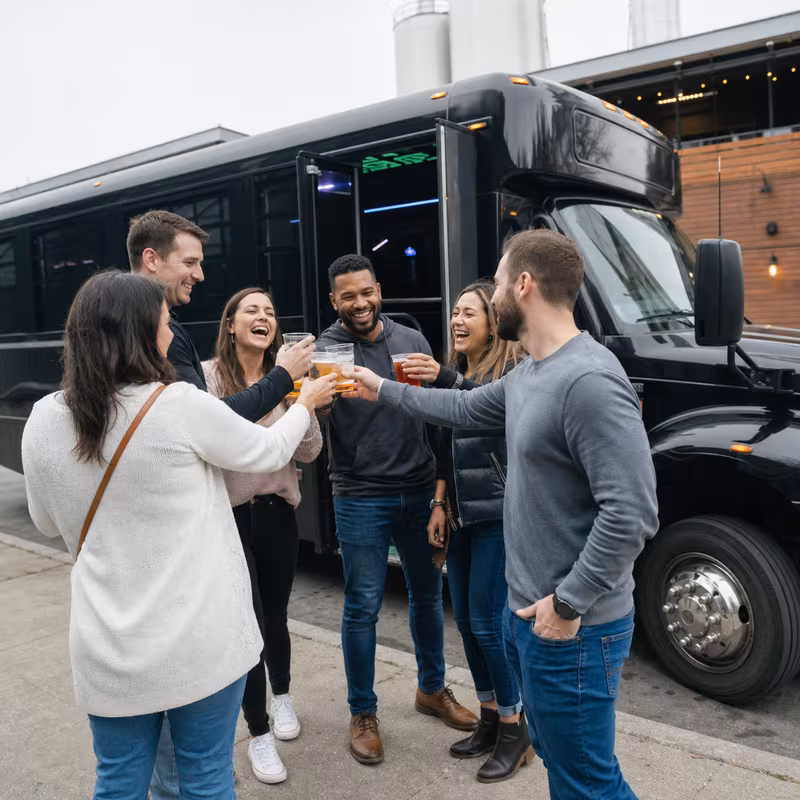 Passengers loading luggage while boarding an New Orleans group shuttle